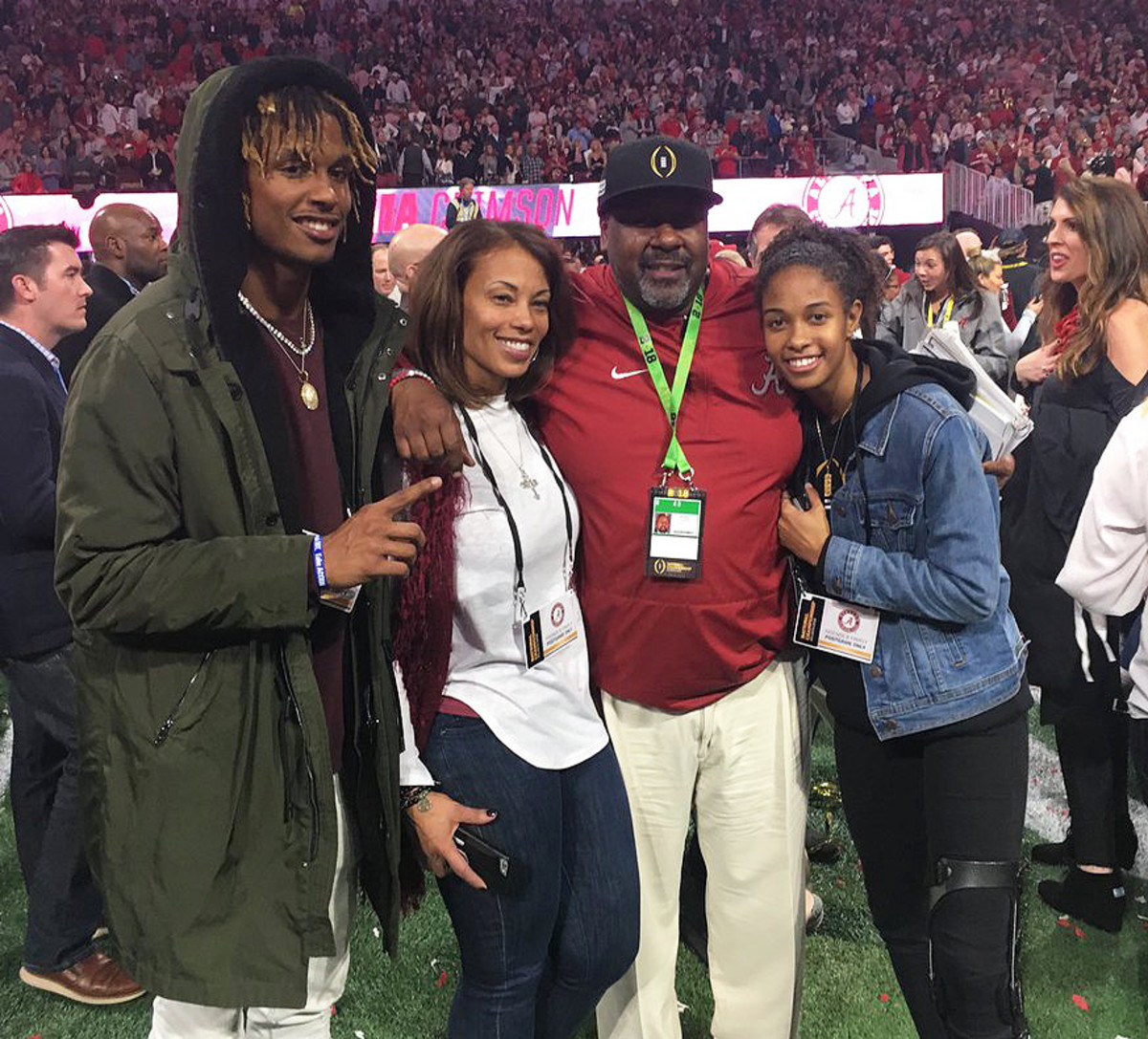 The Locksley family poses for photos after Alabama wins the national championship game over Georgia in 2017. From left to right: Kai Locksley, Kia Locksley, Mike Locksley and Kory Locksley.