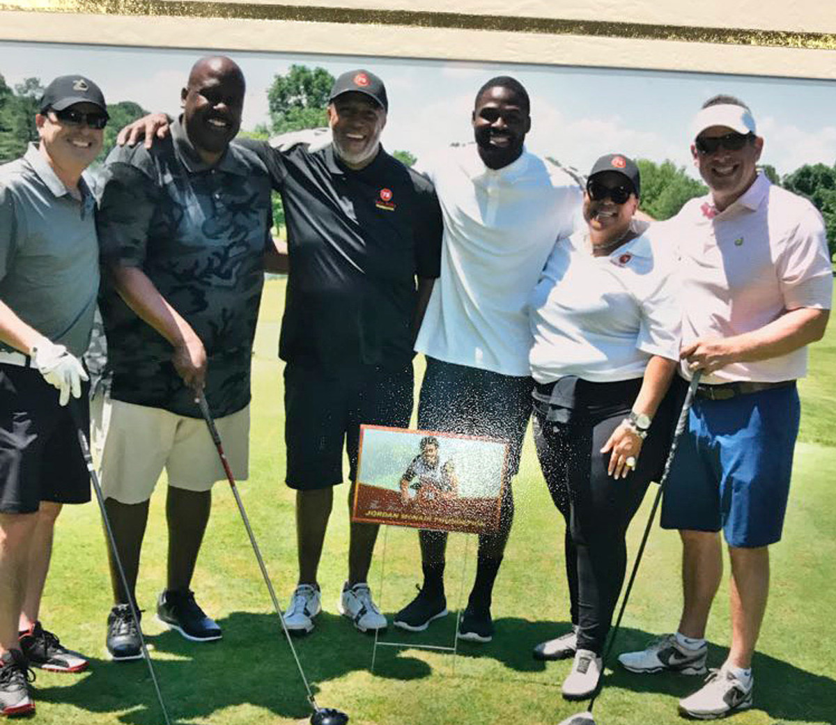 Mike Locksley, second from the left, recently played in a golf tournament for the Jordan McNair Foundation. Marty McNair is pictured here to his left.