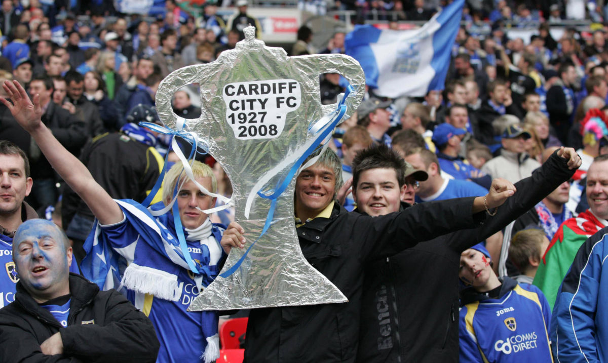 cardiff-football-fans-pose-during-the-fa-5caa0f728b7d99196d000003.jpg