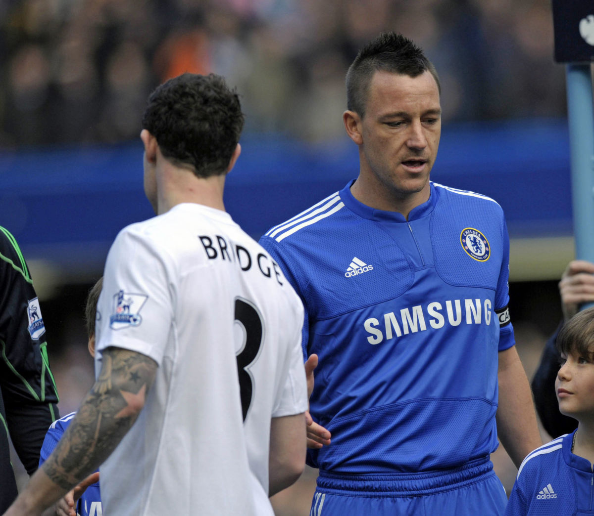 Chelsea's captain John Terry (R) fails t