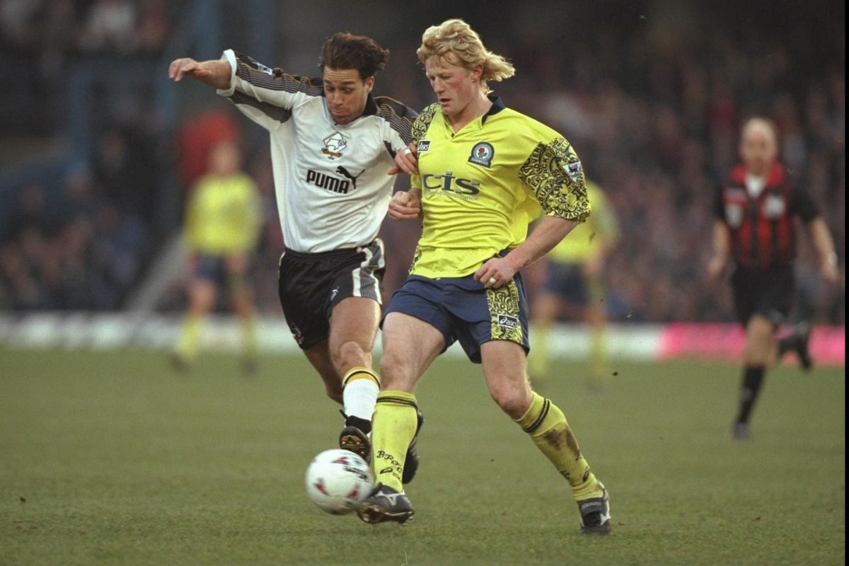 28 Dec 1996:  Ashley Ward of Derby is challenged by Colin Hendry of Blackburn during the Premier Lea