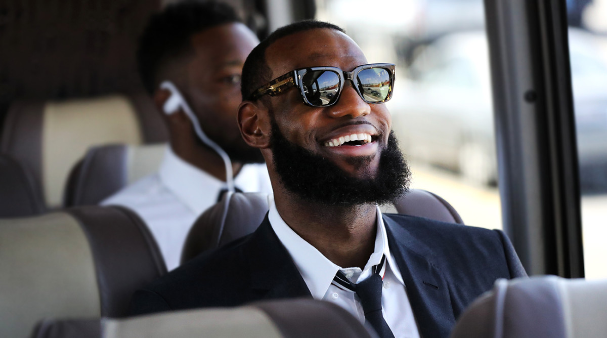 See LeBron James' greatest suits through the years, from oversized