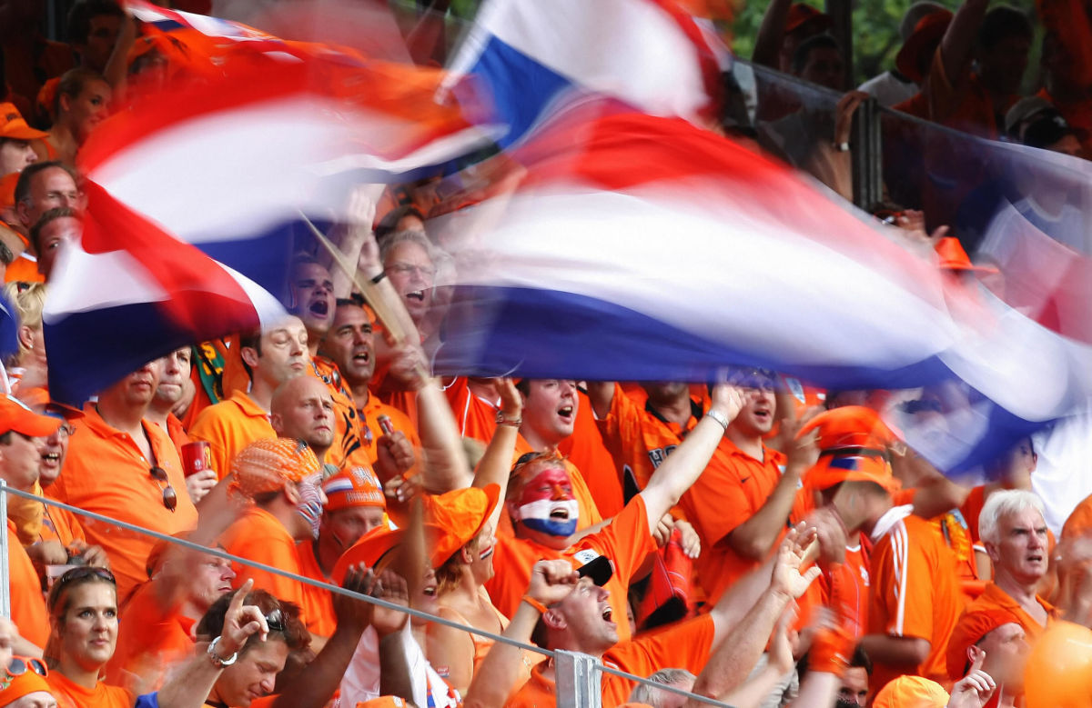 dutch-supporters-wave-national-flags-pri-5b03f241347a025d19000001.jpg