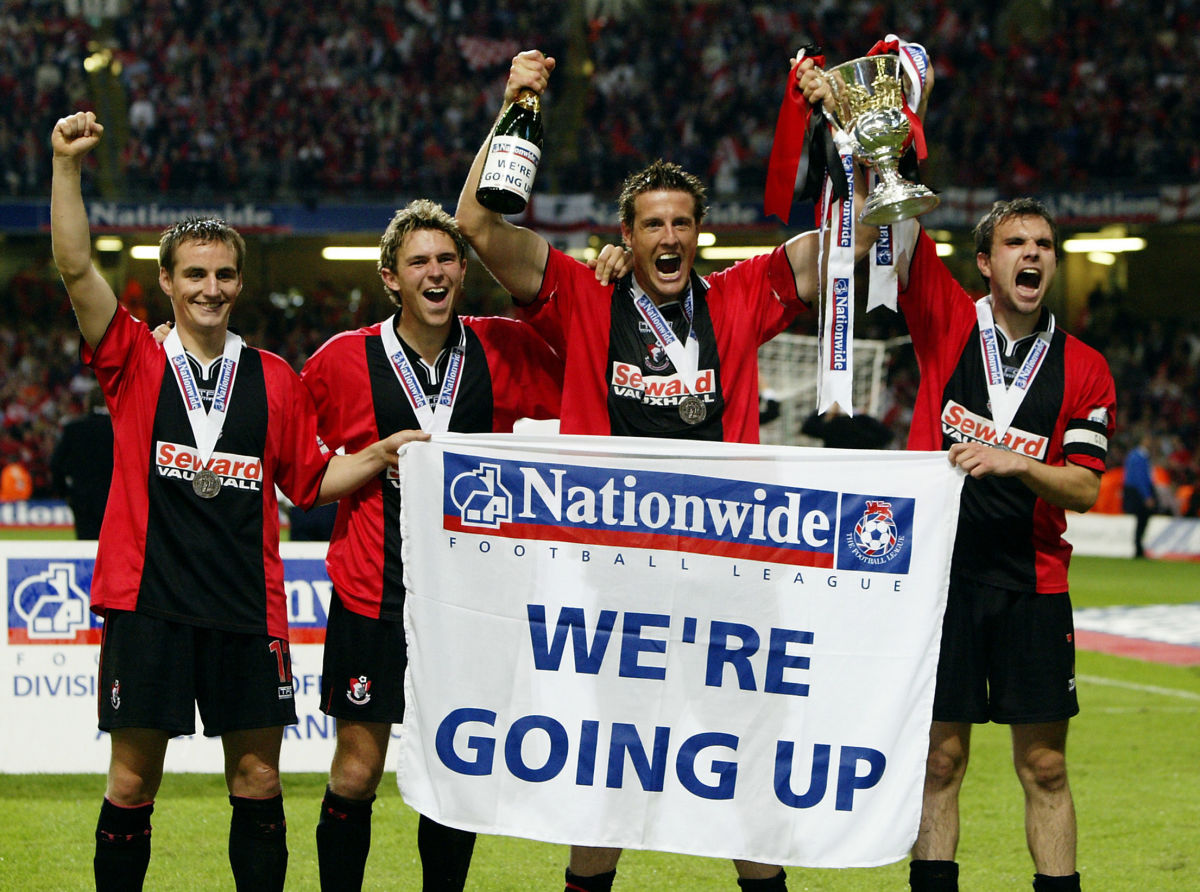 carl-fletcher-steve-fletcher-stephen-purches-and-gareth-o-connor-of-bournemouth-celebrate-5bed421e5cf482c3f6000001.jpg