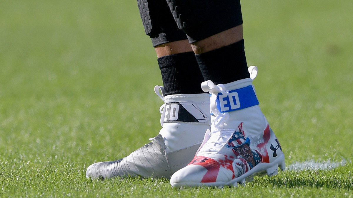 all white cam newton cleats