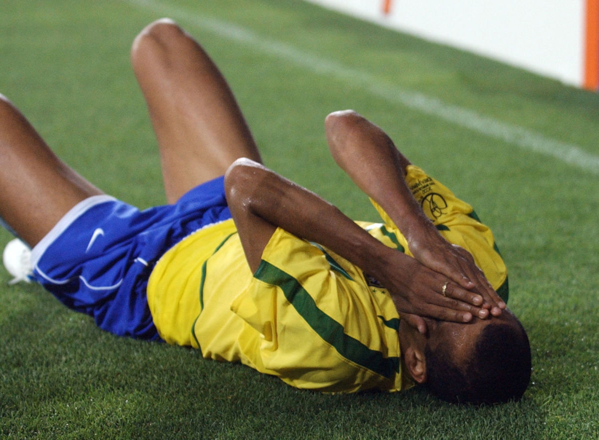 brazil-s-rivaldo-reacts-after-a-foul-03-june-2002-5b4dbd4af7b09d4ffe000014.jpg
