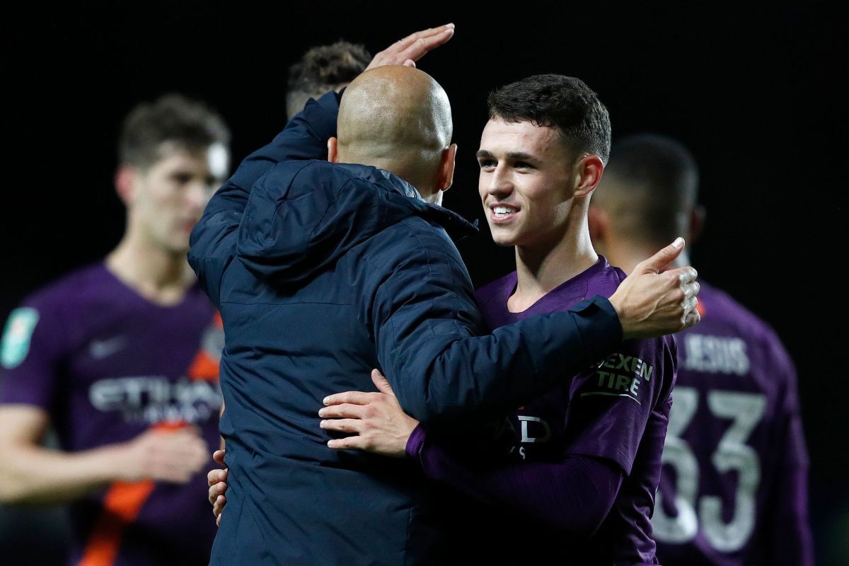 pep-guardiola-with-phil-foden-5bab5a5e73df6158c9000001.jpg