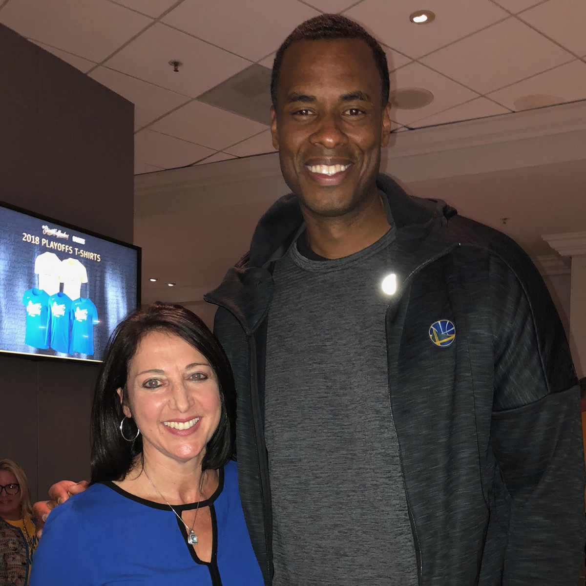 Debbie Spander with client and Warriors assistant coach Jarron Collins. 