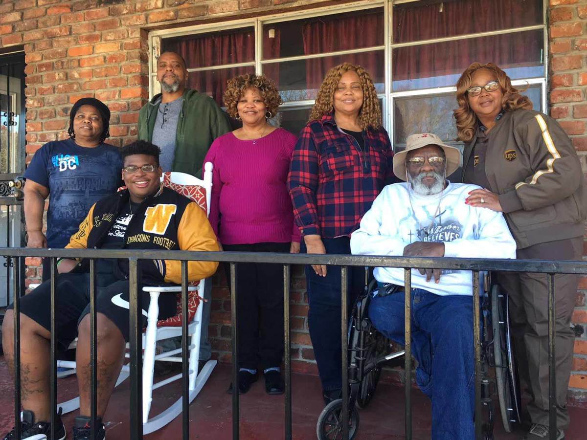 Part of Quinnen Williams's support team is pictured here in a photo taken Wednesday outside of his grandmother's home in Birmingham. From left to right: aunt LaQuita Comack, brother Giovanni Williams, uncle Charles Henderson II, aunt Ivy Allen, grandpa Charles Henderson, grandmother Yvarta Henderson and aunt Marilyn Jackson.