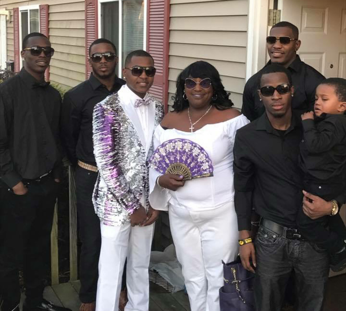 Devon, with mom Yvette, Desmond (back row right) and the rest of the prom crew.