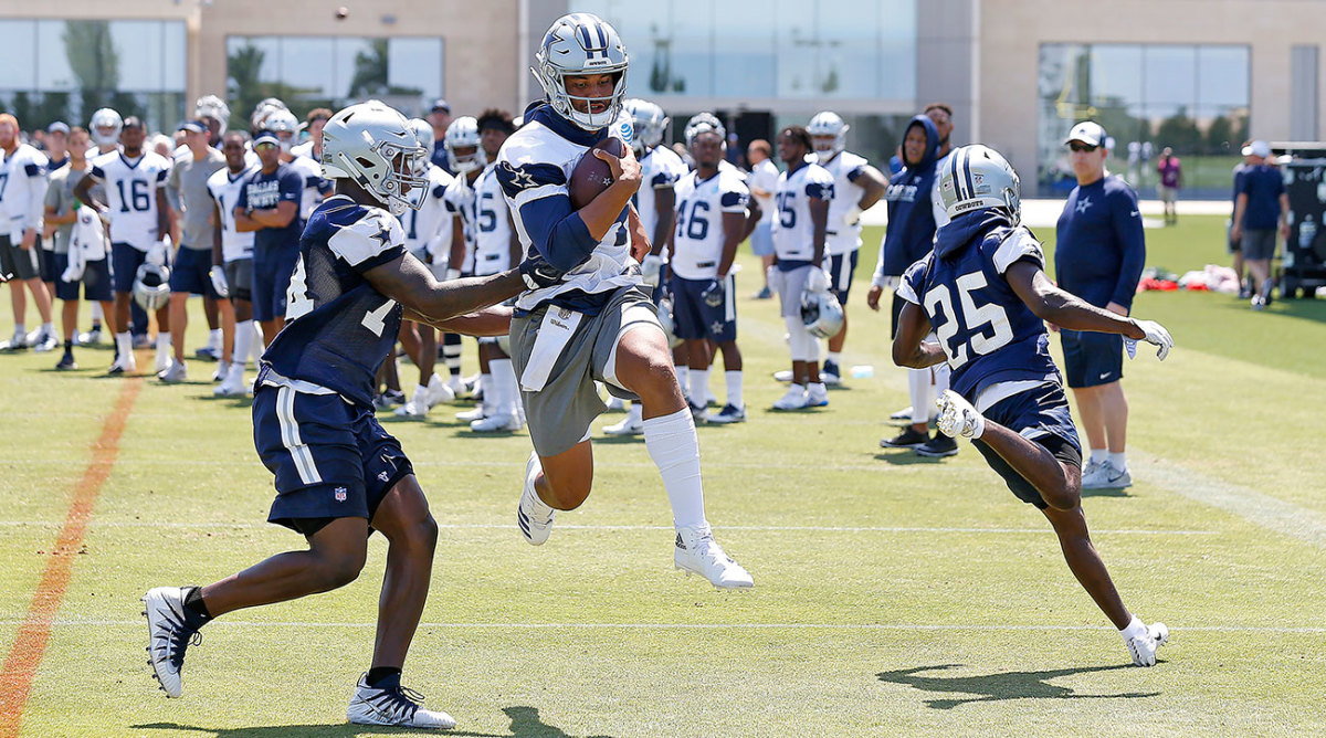 Dak Prescott gets into the action at Cowboys minicamp earlier this month.