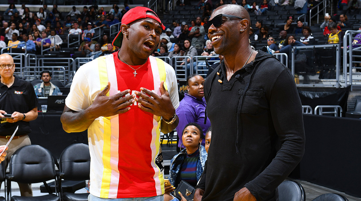 Terrell Owens and Julio Jones take in a WNBA game between the Sparks and the Storm at the Staples Center in Los Angeles.