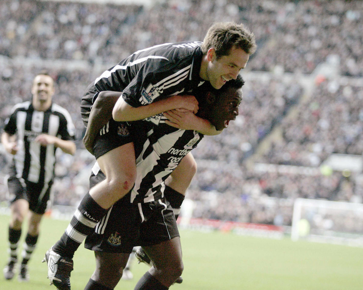 newcastle-s-michael-owen-top-celebrate-5b82bdb110a163dbc4000001.jpg