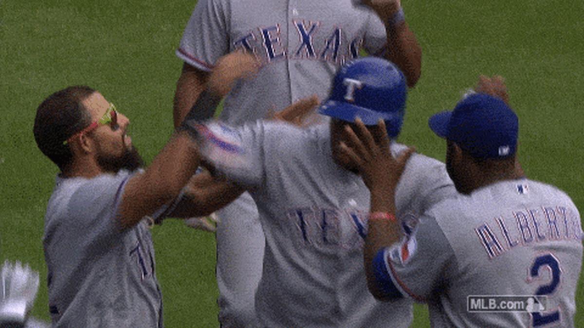 050716_tex_beltre_headtouching_med_jg2386ax.gif
