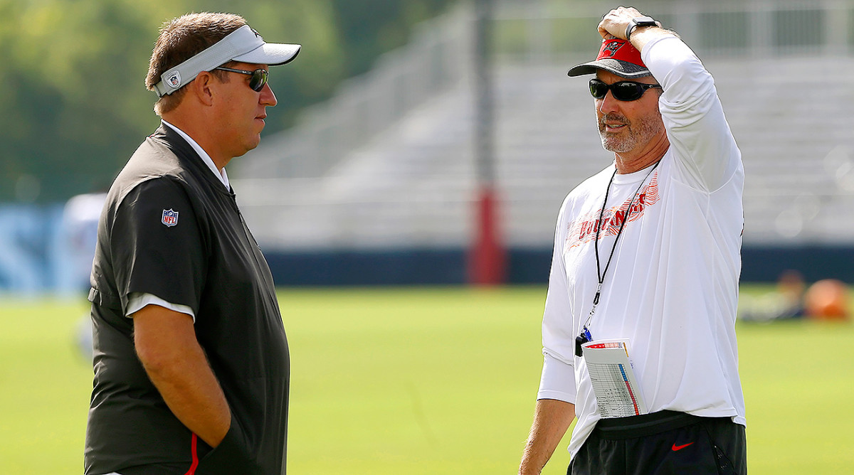 GM Jason Licht (left) and head coach Dirk Koetter in Nashville for joint practices with the Titans.