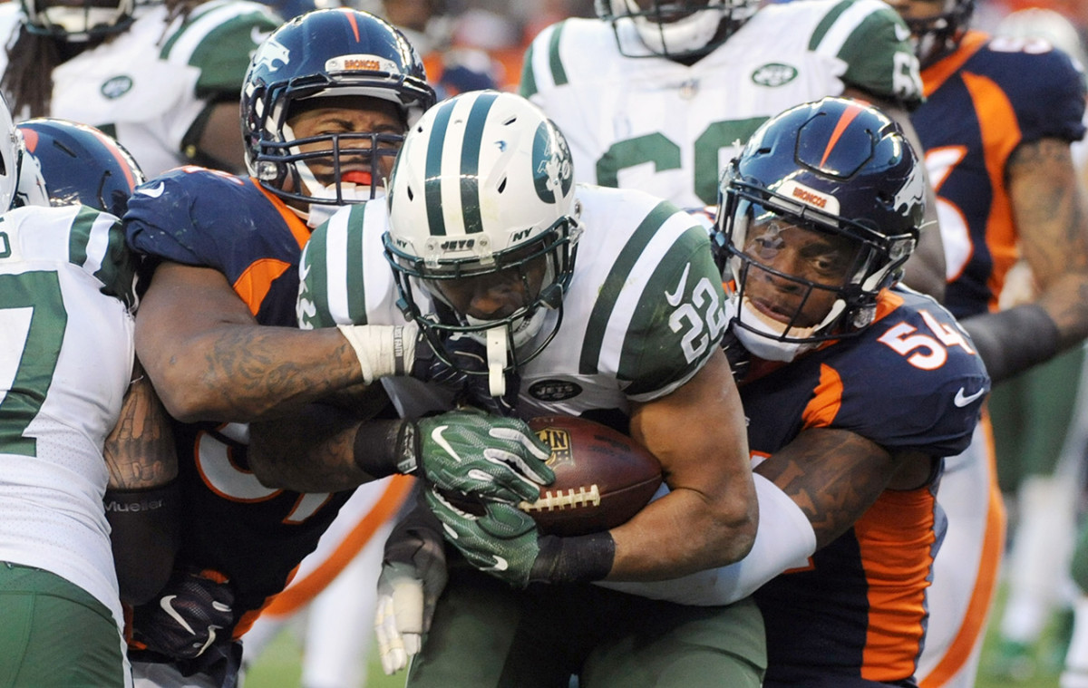 Davis (left) tweaked his ankle against the Jets on Sunday, but he still had to suit up again four days later.