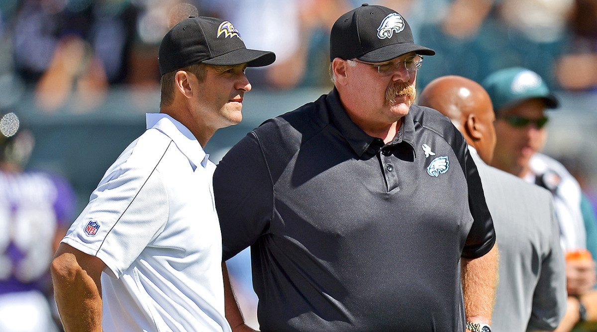 John Harbaugh, pictured here with Andy Reid before a game in 2012, was the special teams coordinator and defensive backs coach or the Eagles from 1998-2007.