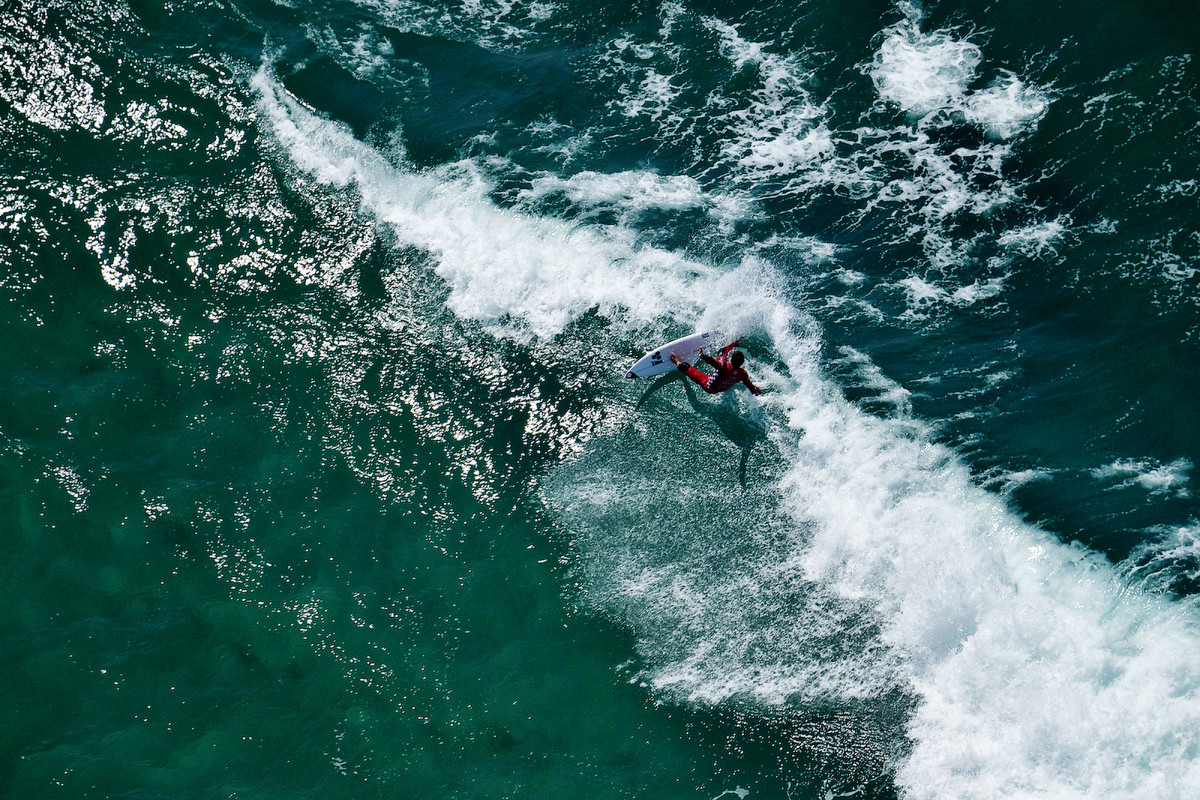 Jorgann Couzinet from France surfing in his heat during the Vans US Open of Surfing