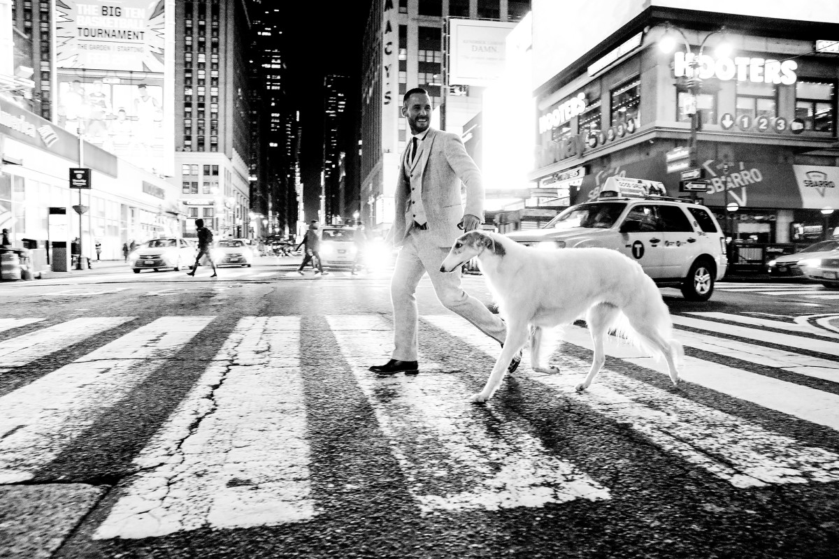 Lucy, a 5-year old borzoi dog, with handler before the 142nd Westminster Dog Show