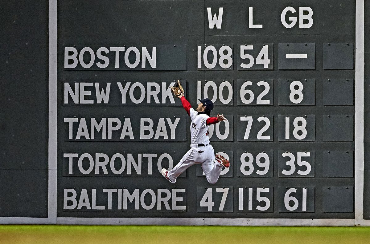 Red Sox left fielder Andrew Benintendi makes a catch during Game 2 of the World Series against the Dodgers