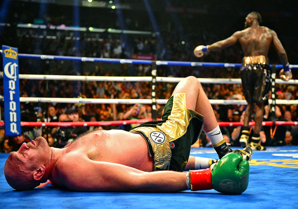 Deontay Wilder walks away from Tyson Fury