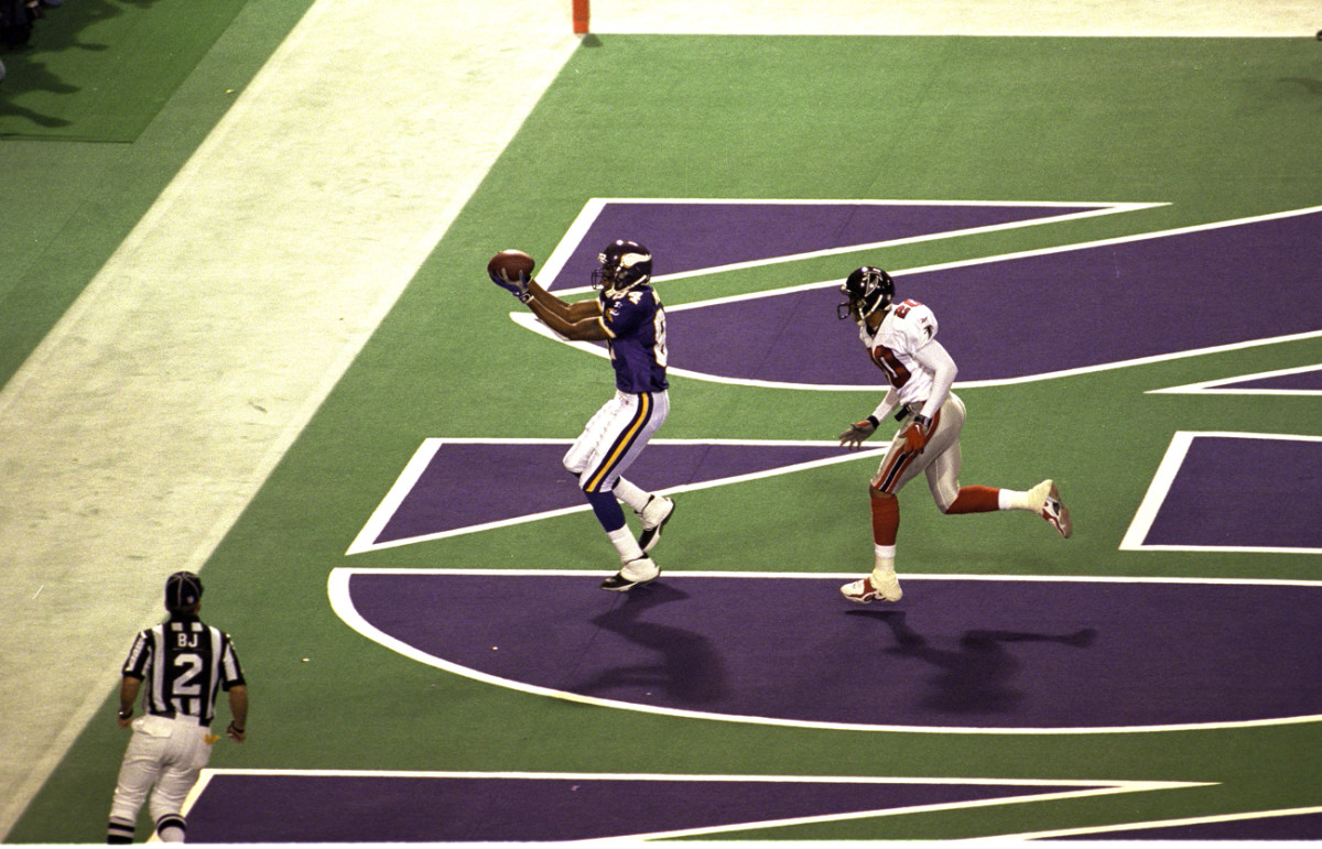 A fingertip touchdown catch by Moss in the NFC title game.