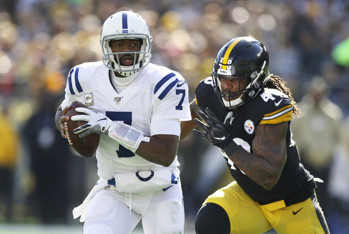 Indianapolis Colts quarterback Jacoby Brissett tries to avoid the Pittsburgh Steelers pass rush in Sunday's road game at Heinz Field.