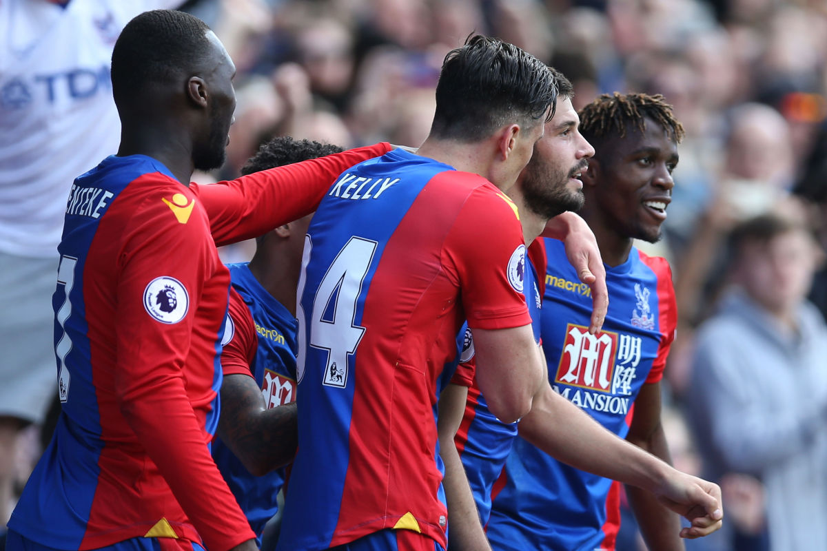 LONDON, ENGLAND - MAY 14: Luka Milivojevic of Crystal Palace celebrates scoring his sides third goal with his Crystal Palace team mates during the Premier League match between Crystal Palace and Hull City at Selhurst Park on May 14, 2017 in London, England.  (Photo by Steve Bardens/Getty Images)