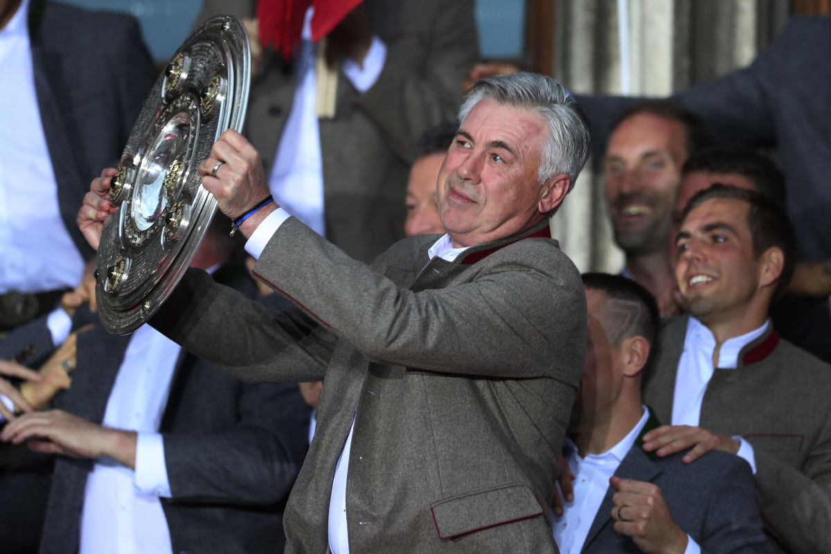 MUNICH, GERMANY - MAY 20:  Carlo Ancelotti, Manager of Bayern Muenchen celebrates winning the 67th German Championship title on the town hall balcony at Marienplatz on May 20, 2017 in Munich, Germany.  (Photo by Alexandra Beier/Bongarts/Getty Images)
