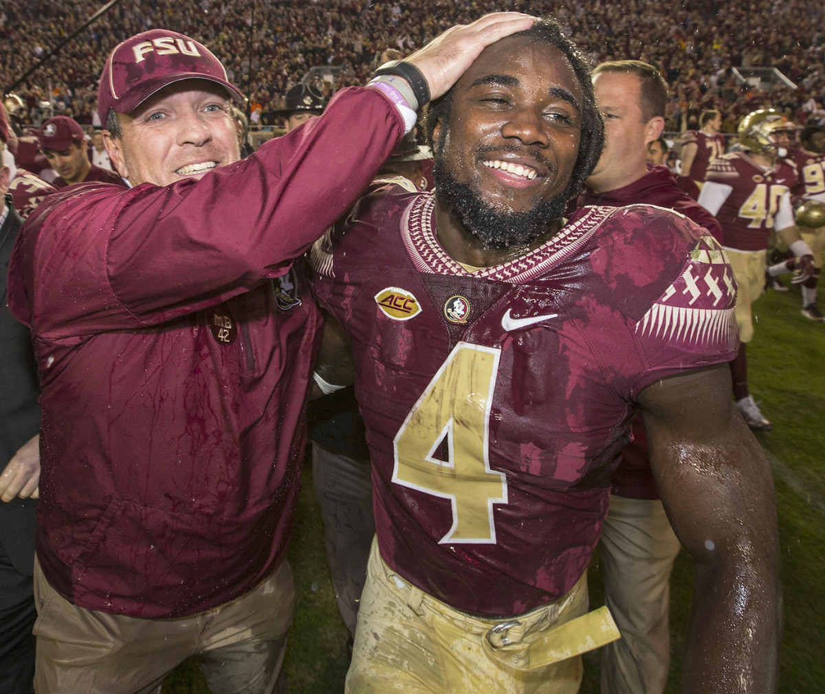 Fisher and Cook celebrate a win over Florida.