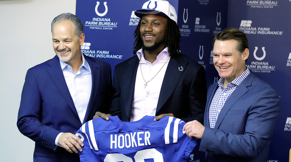 Malik Hooker stands with coach Chuck Pagano (left) and GM Chris Ballard after the Colts made the Ohio State safety the 15th pick in the draft.