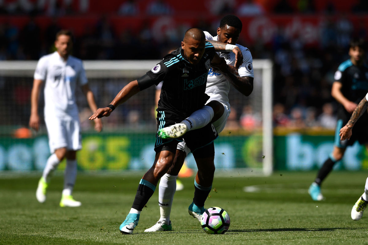 SWANSEA, WALES - MAY 21:  Jose Salomon Rondon of West Bromwich Albion and Leroy Fer of Swansea City battle for possession during the Premier League match between Swansea City and West Bromwich Albion at Liberty Stadium on May 21, 2017 in Swansea, Wales.  (Photo by Stu Forster/Getty Images)