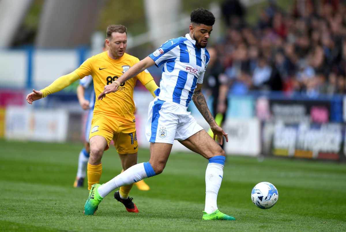 HUDDERSFIELD, ENGLAND - APRIL 14:  Philip Billing of Huddersfield gets past Aiden McGeady of Preston during the Sky Bet Championship match between Huddersfield Town and Preston North End at Galpharm Stadium on April 14, 2017 in Huddersfield, England.  (Photo by Gareth Copley/Getty Images)