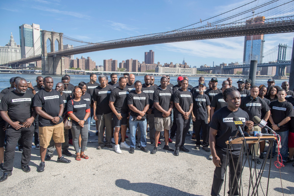 Members of law enforcement rallied in New York City on Saturday to show support for unemployed quarterback Colin Kaepernick.