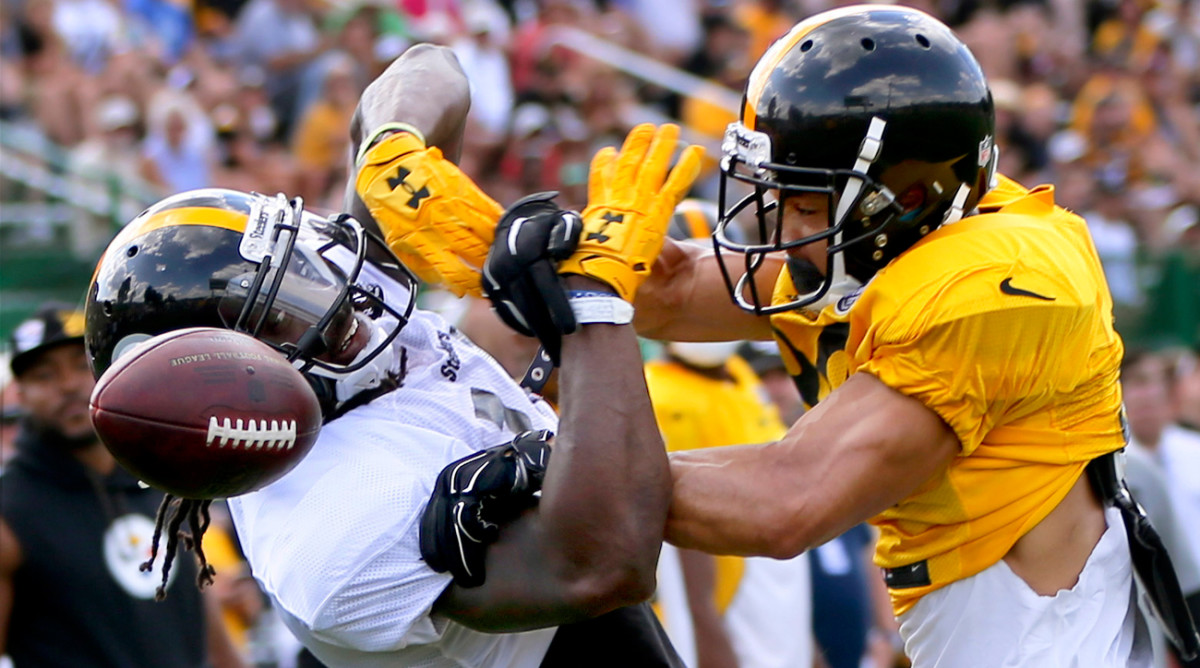 The Steelers embrace a physical culture at camp, as shown here by cornerback Artie Burns (right) and wide receiver Sammie Coates.