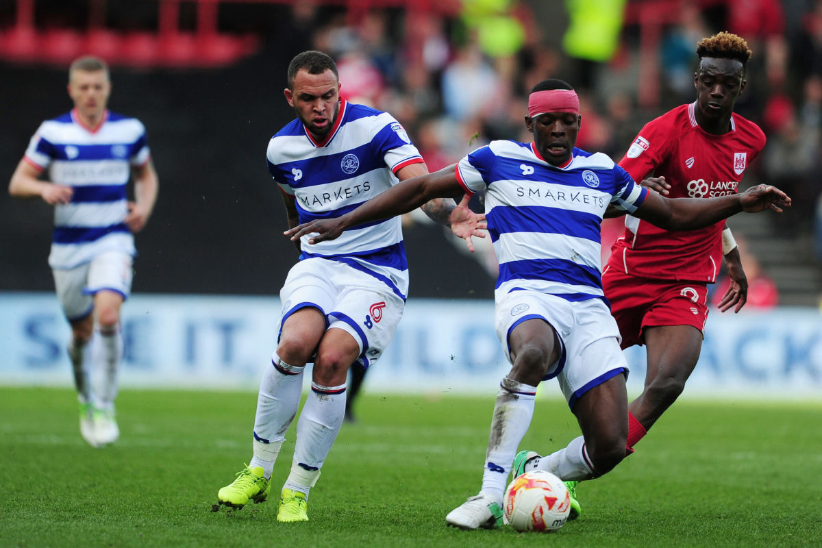 BRISTOL, UNITED KINGDOM - APRIL 14: Nedum Onuoha of Queens Park Rangers is tackled by Tammy Abraham of Bristol City during the Sky Bet Championship match between Bristol City and Queens Park Rangers at Ashton Gate on April 14, 2017 in Bristol, England. (Photo by Harry Trump/Getty Images)