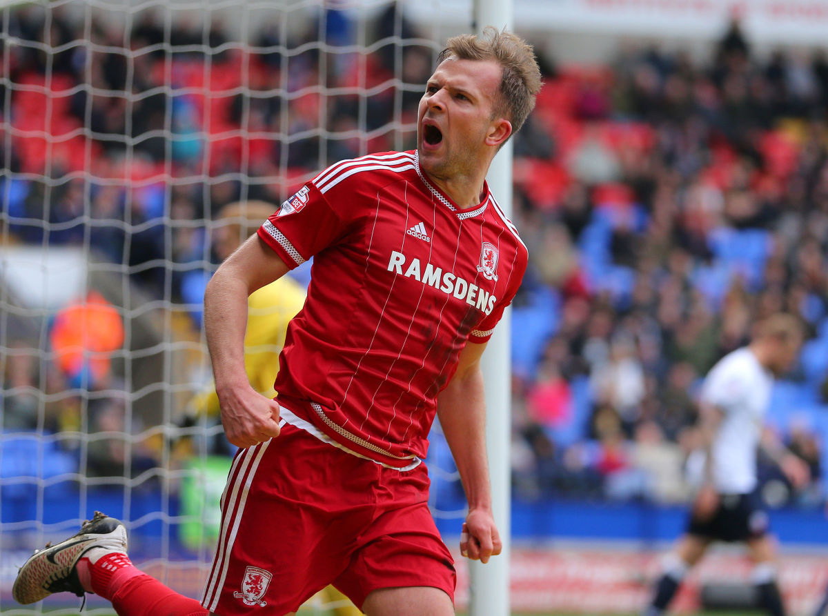BOLTON, ENGLAND - APRIL 16: Jordan Rhodes of Middlesbrough celebrates scoring his side's first goal of the match during the Sky Bet Championship match between Bolton Wanderers and Middlesbrough at the Macron Stadium on April 16, 2016 in Bolton, United Kingdom. (Photo by Dave Thompson/Getty Images)