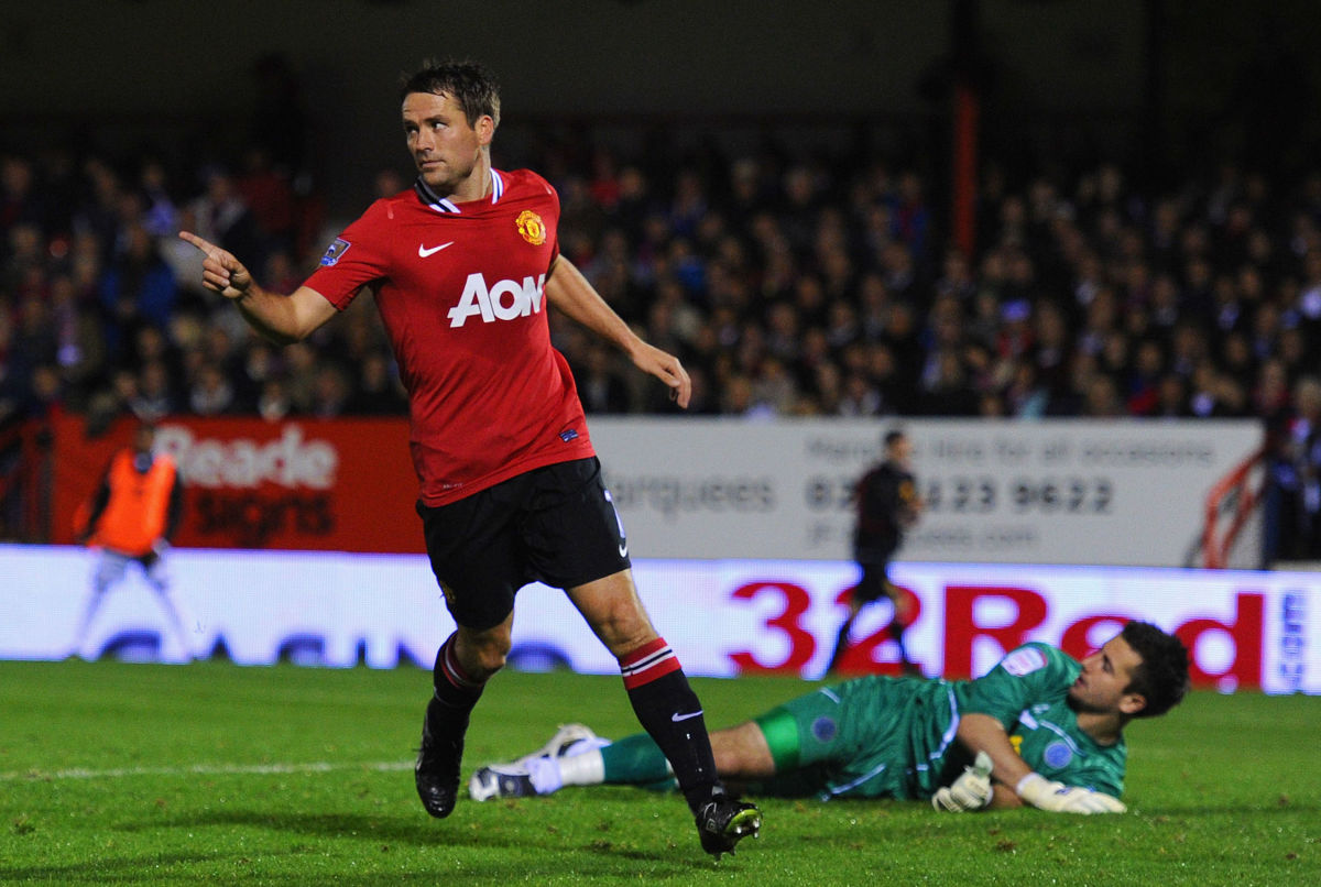 ALDERSHOT, ENGLAND - OCTOBER 25:  Michael Owen of Manchester United celebrates scoring to make it 2-0 during the Carling Cup fourth round match between Aldershot Town and Manchester United at the EBB Stadium, Recreation Ground on October 25, 2011 in Aldershot, England.  (Photo by Michael Regan/Getty Images)