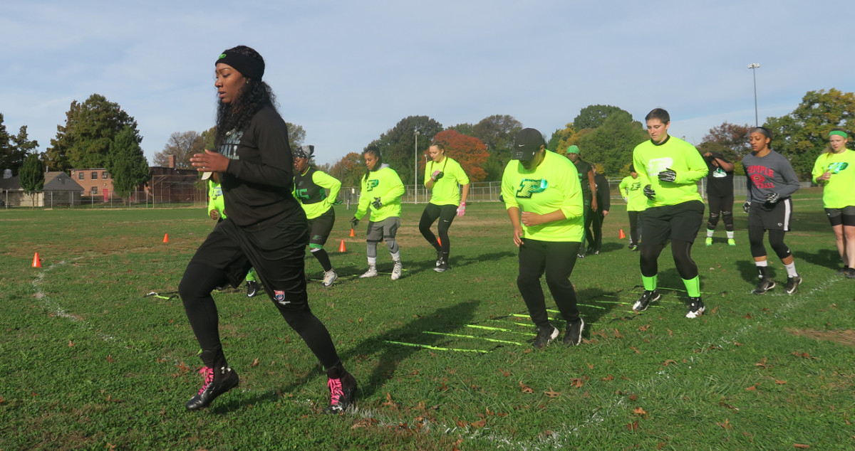 Star Wright, founder of the Philadelphia Phantomz, leads her team through workouts.