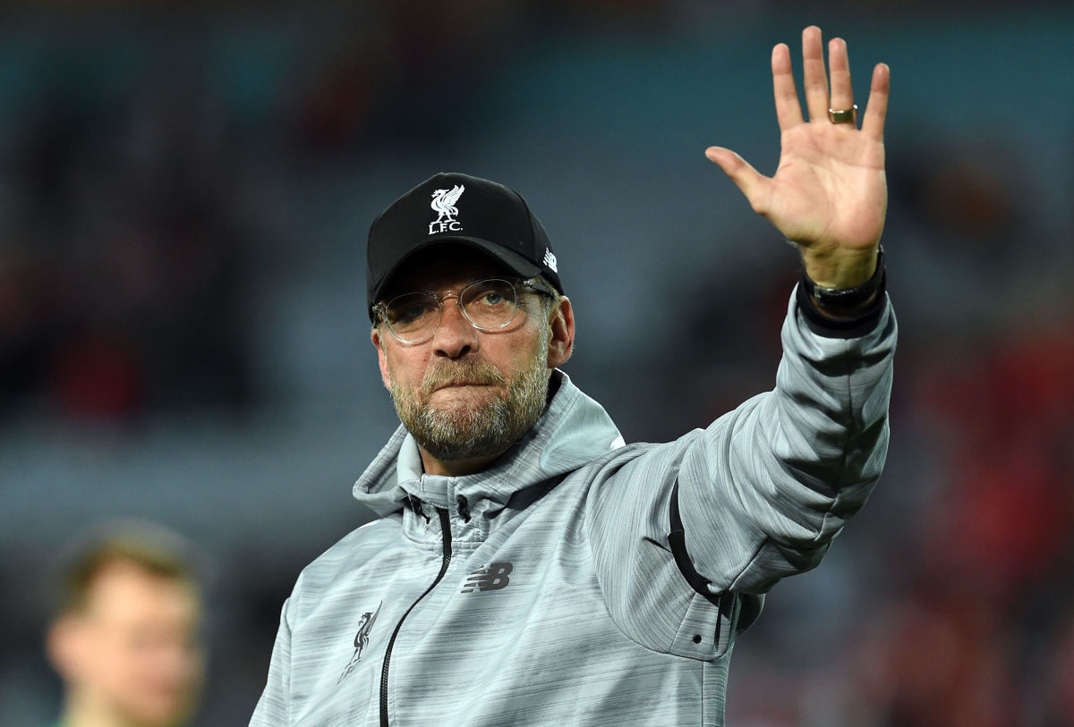 Liverpool coach Jurgen Klopp waves to the fans after their end-of-season friendly football match against Sydney FC at the Olympic Stadium in Sydney on May 24, 2017. / AFP PHOTO / SAEED KHAN / IMAGE RESTRICTED TO EDITORIAL USE - STRICTLY NO COMMERCIAL USE        (Photo credit should read SAEED KHAN/AFP/Getty Images)