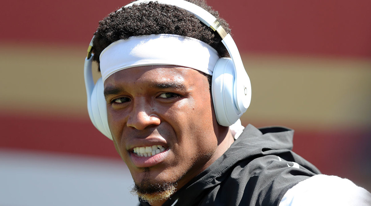 Cam Newton apologized a day after laughing at a female reporter's question.