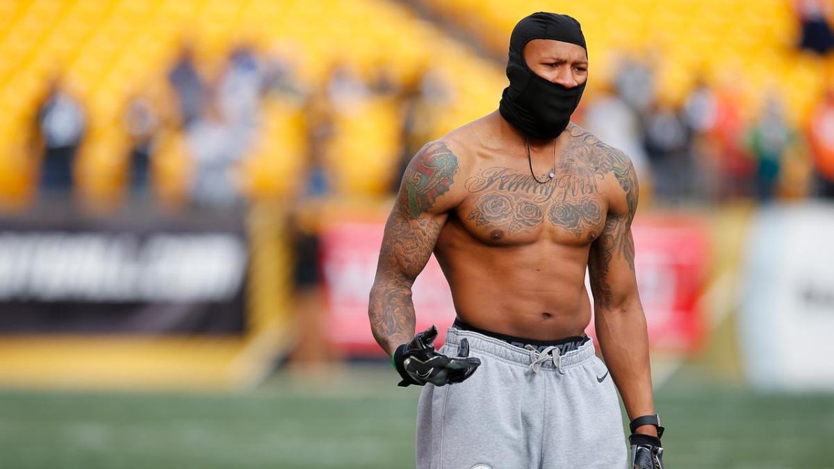 NFL players warmed up shirtless in frigid temperatures.