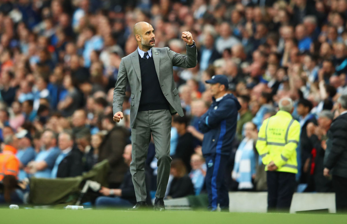 MANCHESTER, ENGLAND - MAY 16:  Josep Guardiola, Manager of Manchester City celebrates his side scoring during the Premier League match between Manchester City and West Bromwich Albion at Etihad Stadium on May 16, 2017 in Manchester, England.  (Photo by Clive Mason/Getty Images)