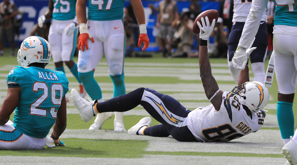Antonio Gates was mobbed by teammates moments after his record-breaking catch and was emotional in the locker room after the game discussing the achievement.