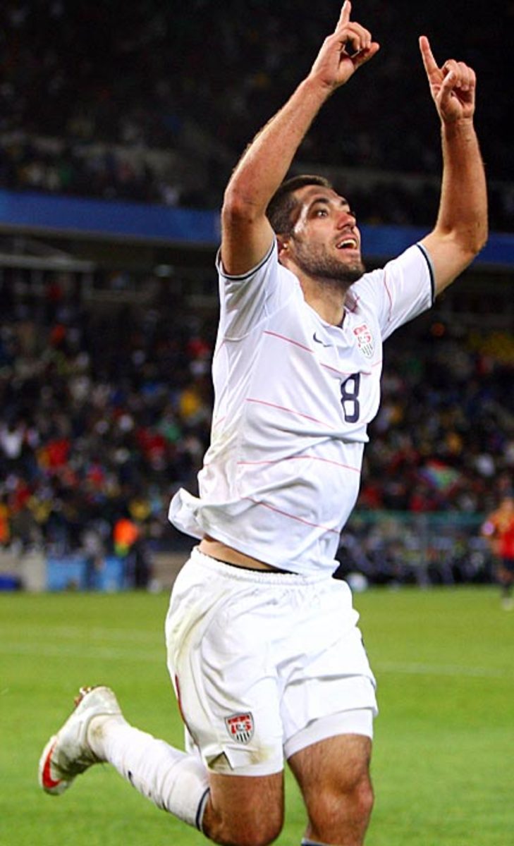 U.S. soccer star Clint Dempsey drives fast, with a fistful of