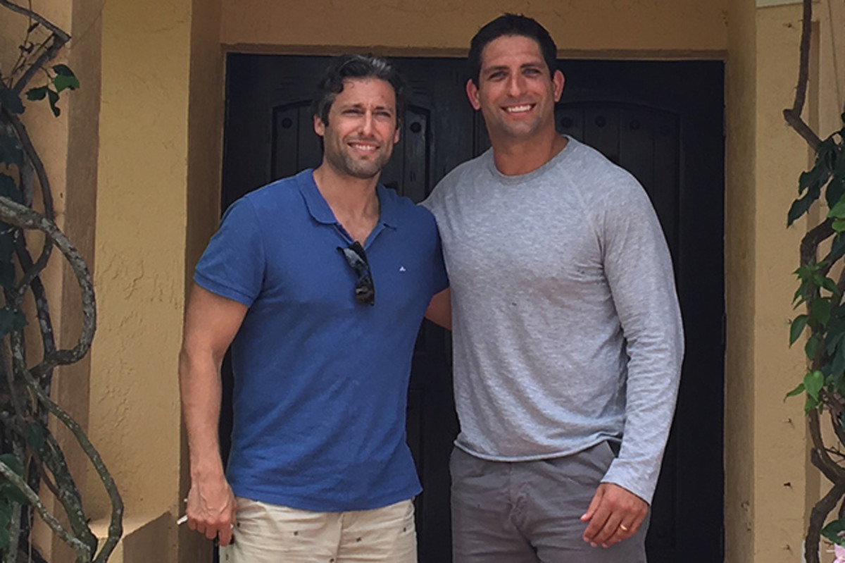Fasano (right) and Antine, in the doorway of a treatment center.
