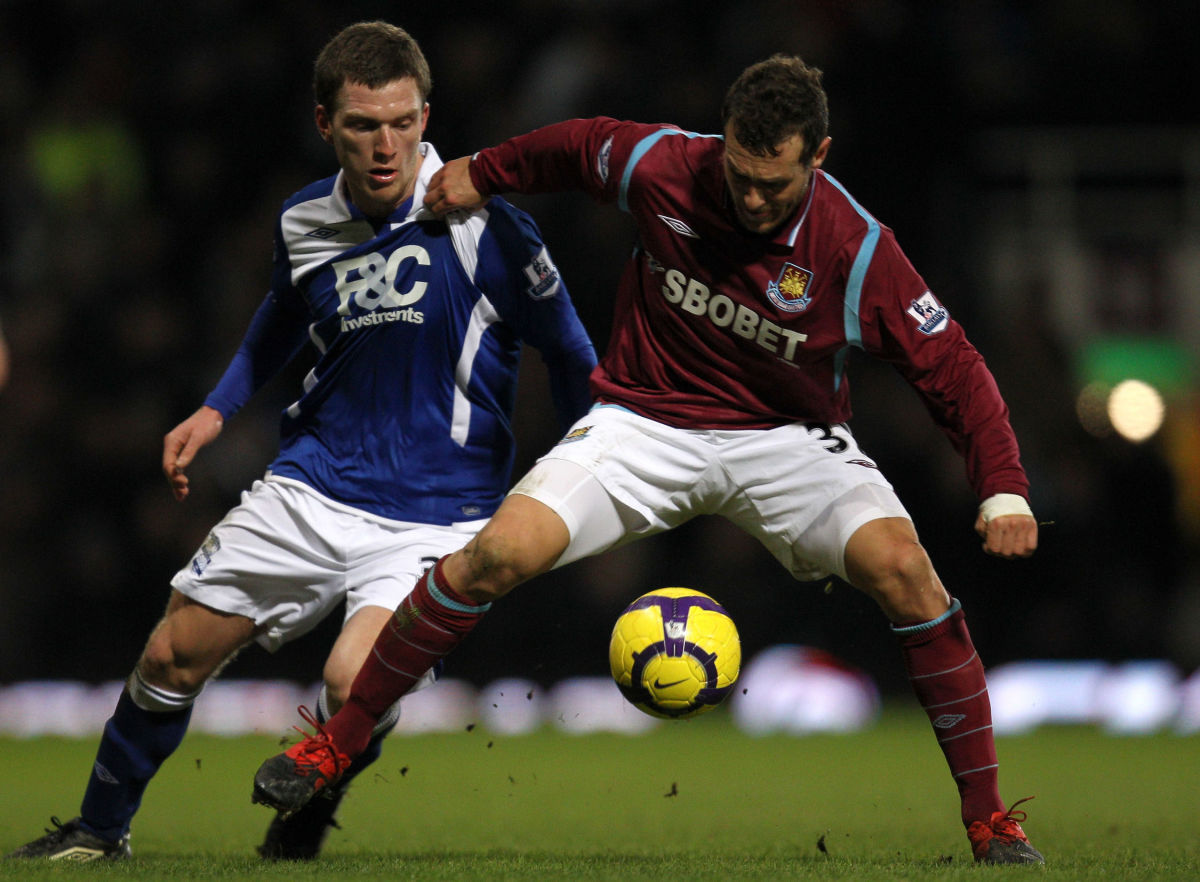 LONDON, ENGLAND - FEBRUARY 10:  Alessandro Diamanti of West Ham United battles for the ball with Liam Ridgewell of Birmingham City during the Barclays Premier League match between West Ham United and Birmingham City at Boleyn Ground on February 10, 2010 in London, England.  (Photo by Paul Gilham/Getty Images)