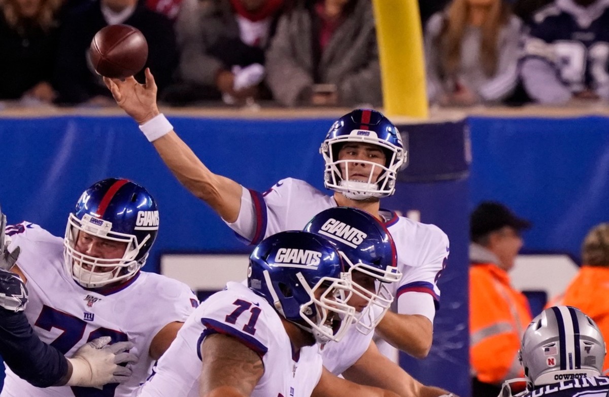 Nov 4, 2019; East Rutherford, NJ, USA; New York Giants quarterback Daniel Jones (8) throws an interception in the 1st half against the Cowboys at MetLife Stadium.