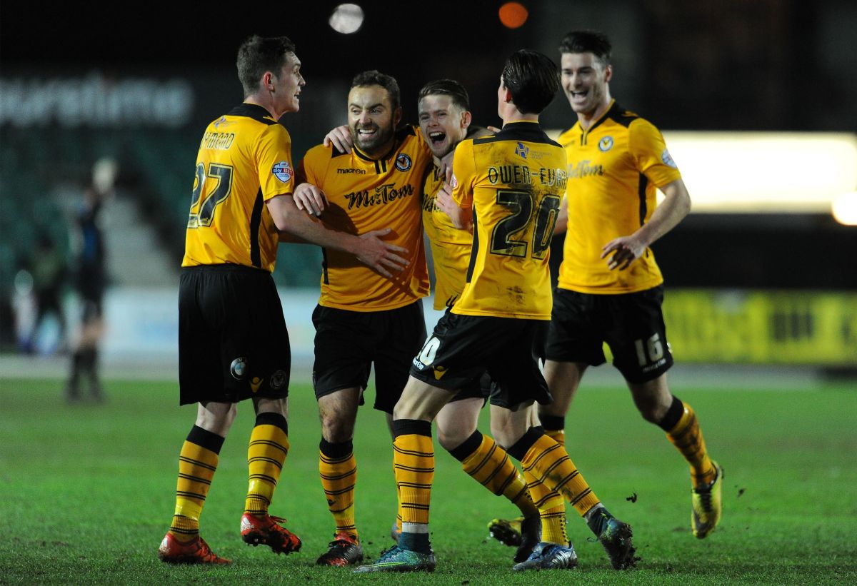 NEWPORT, WALES - JANUARY 18:  Mark Byrne of Newport County (C) celebrates his sides first goal during the Emirates FA Cup Third Round match between Newport County and Blackburn Rovers at Rodney Parade on January 18, 2016 in Newport, Wales. (Photo by Harry Trump/Getty Images)