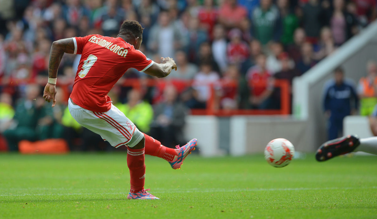 NOTTINGHAM, ENGLAND - SEPTEMBER 14: Britt Assombalonga of Forest scpores to make it 1-0 during the Sky Bet Championship match between Nottingham Forest and Derby County at the City Ground on September 14, 2014 in Nottingham, England.  (Photo by Michael Regan/Getty Images)